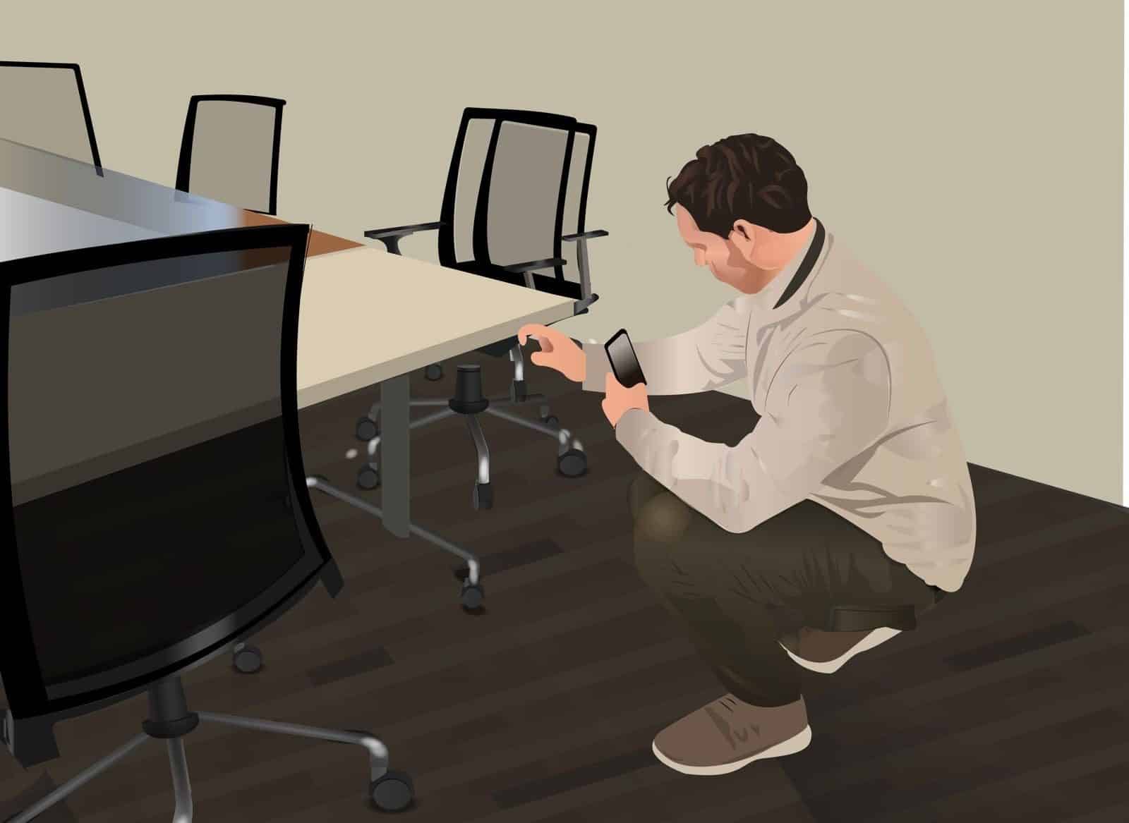 our employee taking measurements on client site conducting built environment accessibility assessment